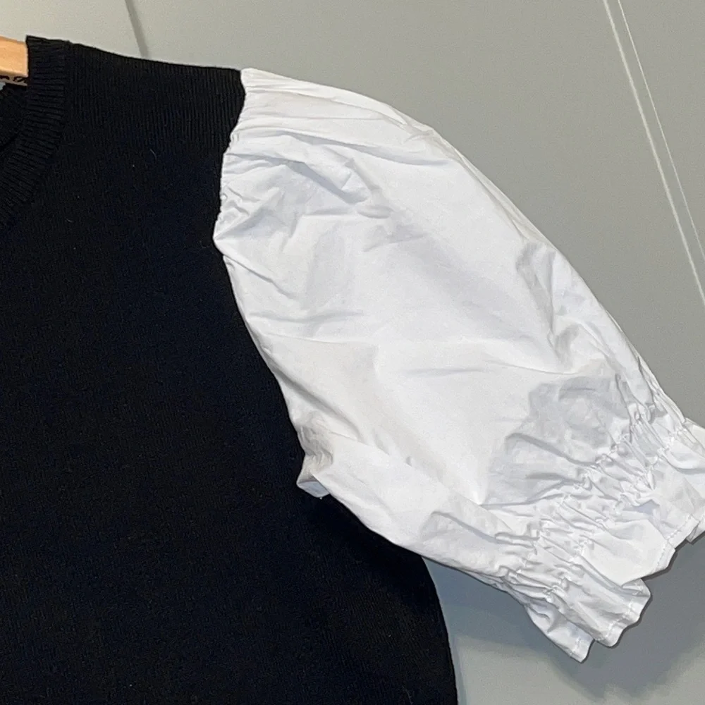 Anthropologie Black and White Ruffle Sleeve Blouse